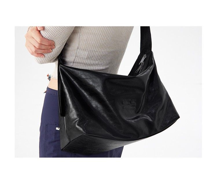 EMBOSSED SHOULDER BAG