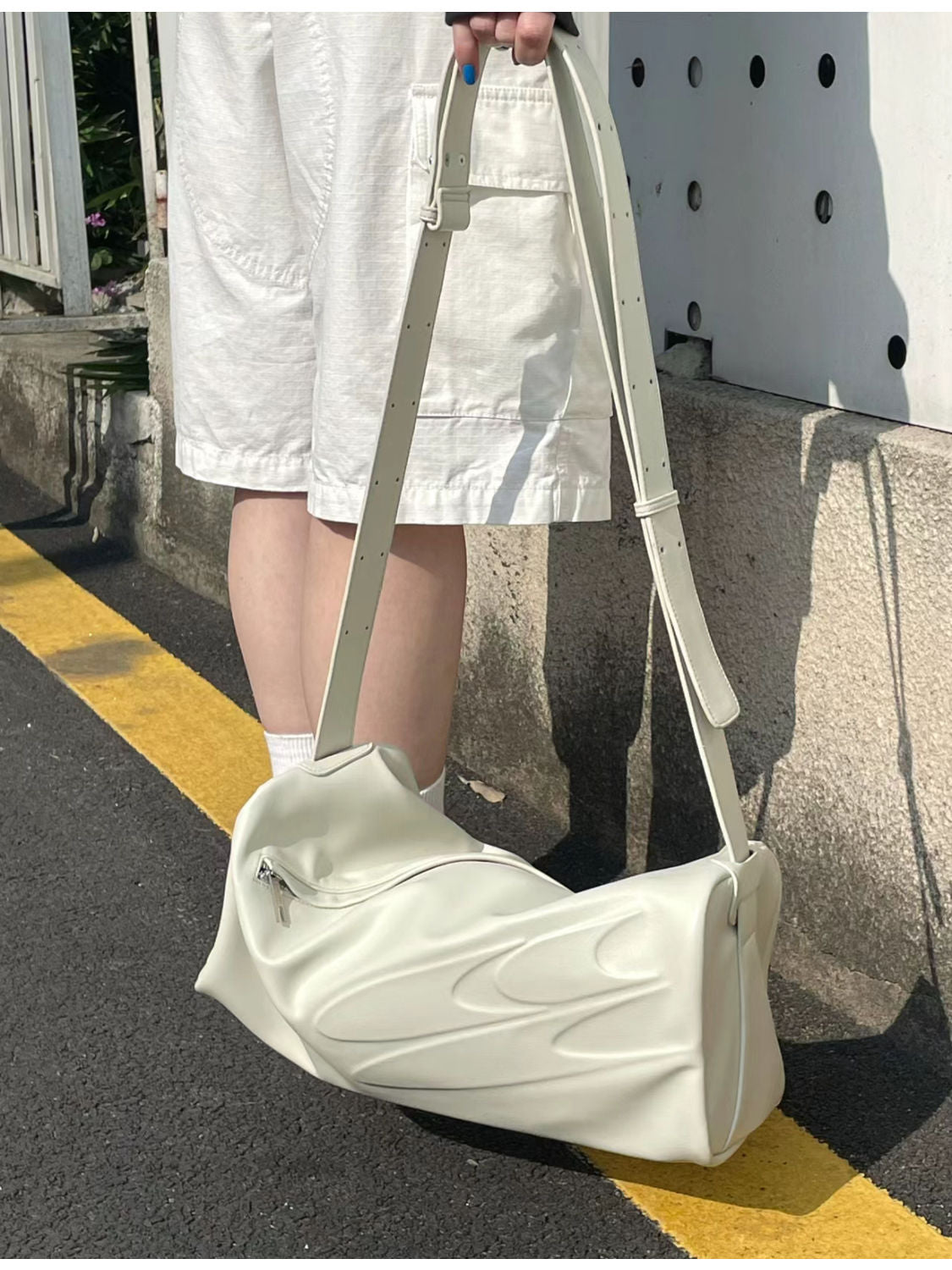 EMBOSSED LOGO CROSSBODY BAG