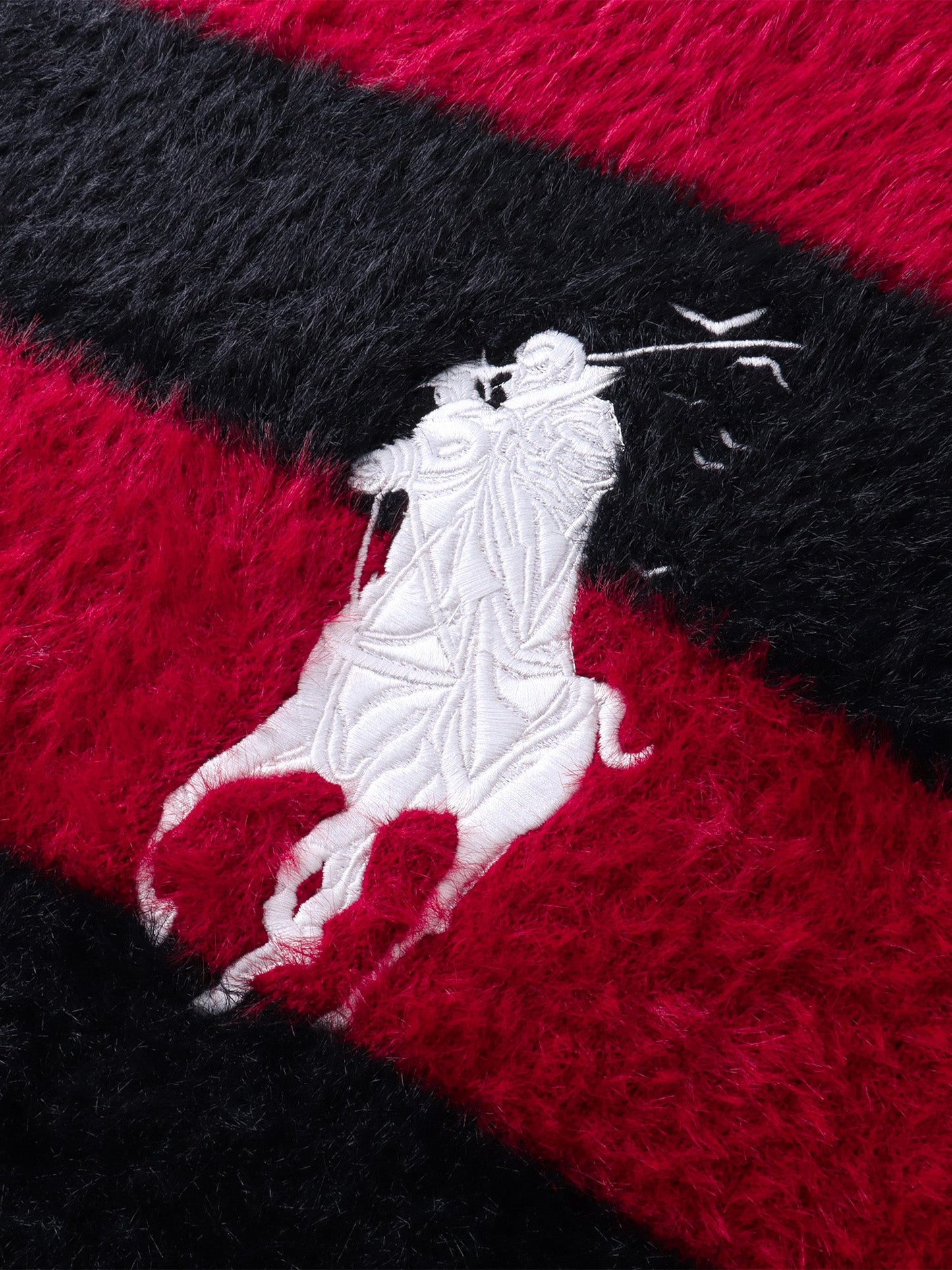 PRINCE OF DARKNESS FAUX FUR STRIPED SWEATER