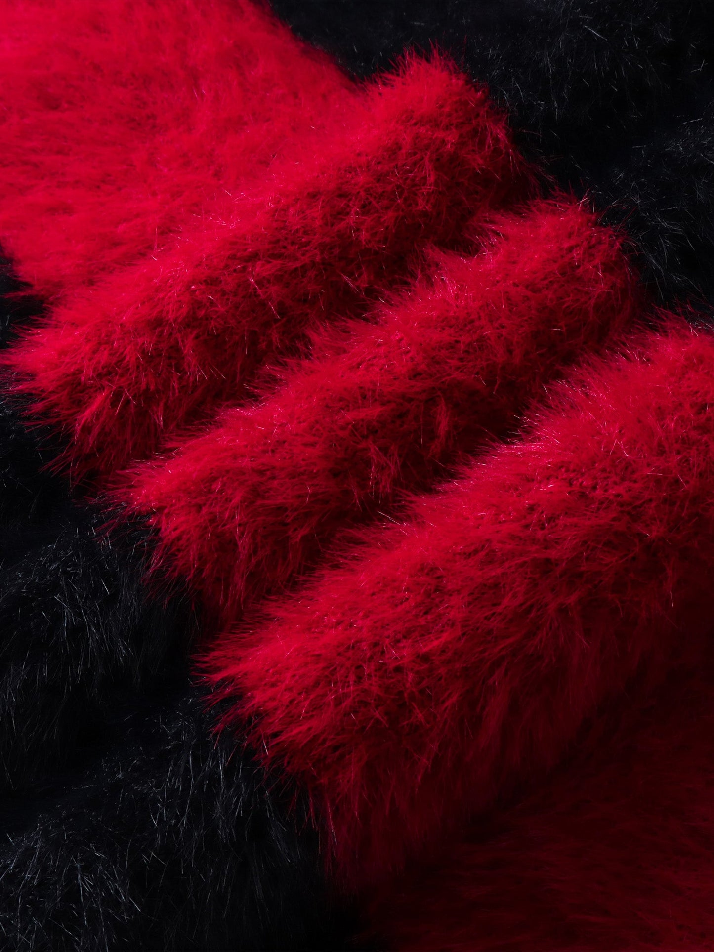 PRINCE OF DARKNESS FAUX FUR STRIPED SWEATER