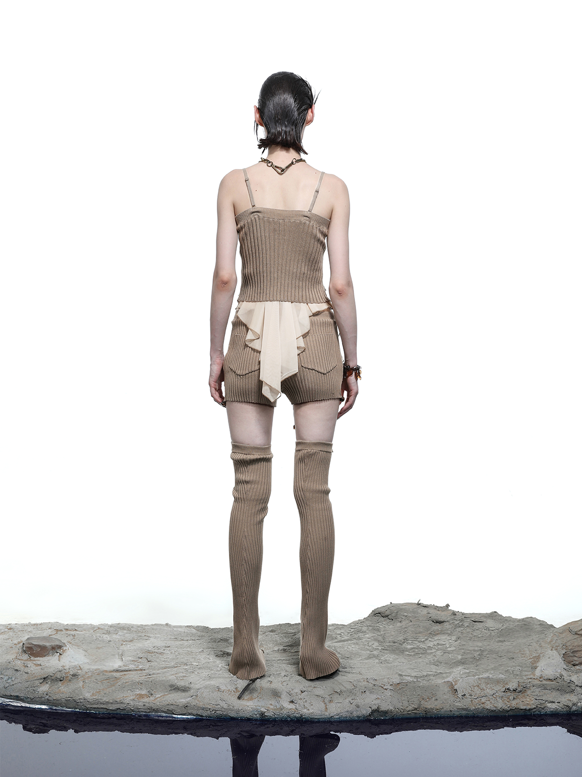 DISTRESSED KNITTED TOP WITH RUFFLES