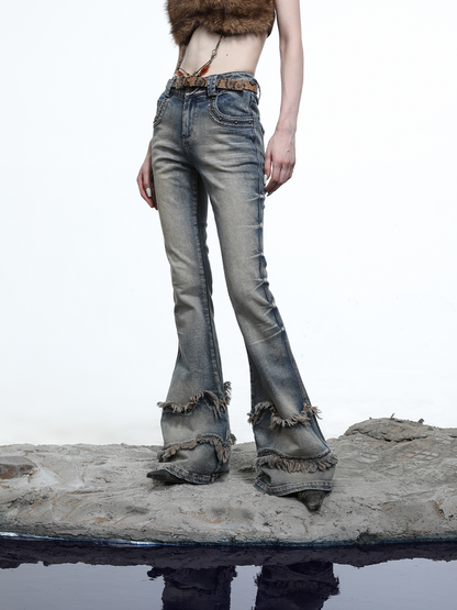 FLARED DISTRESSED JEANS